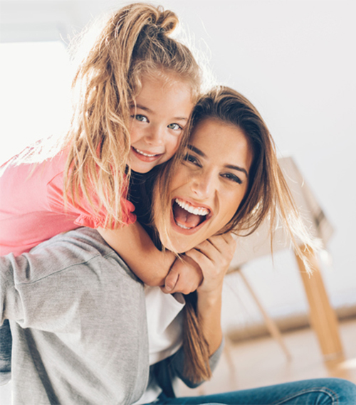 Mom and daughter at Sirius Orthodontics in Syracuse, Liverpool, Baldwinsville, and Geneva, NY